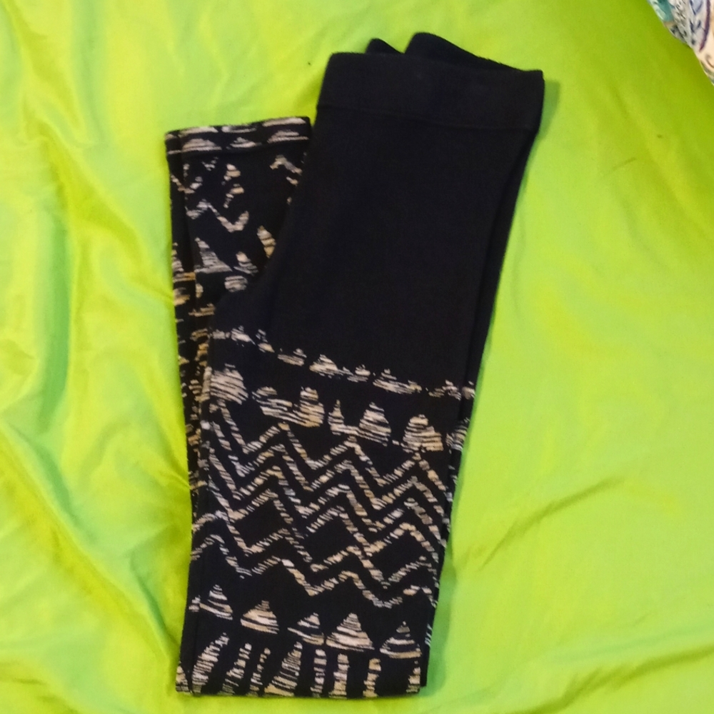 Women's leggings Free People size medium black with cream pattern
